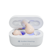 Audien Hearing Atom 2 hearing aids with open charging case showing one device elevated

