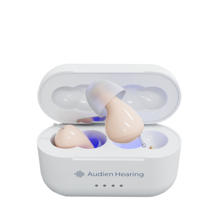 Audien Hearing Atom 2 hearing aids with open charging case showing one device elevated

